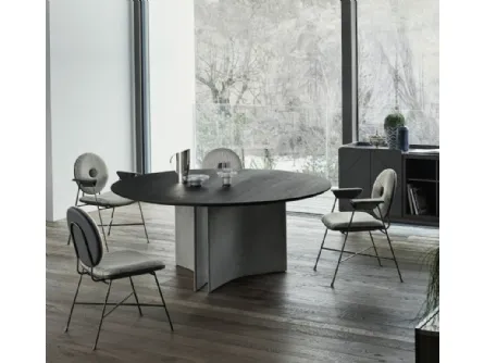 Tavolo rotondo Magnum con base in cemento e piano in legno impiallaciato di Bontempi